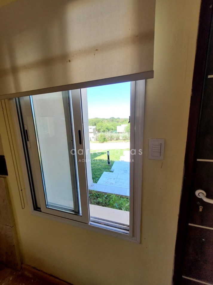 APTO CREDITO. VILLA CATALINA E-53 CASA DE 2 DORM